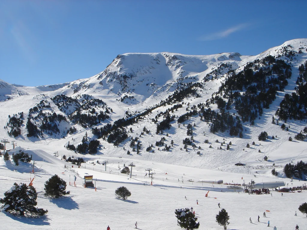 Snow-covered slopes and mountain scenery at Grandvalira in Andorra