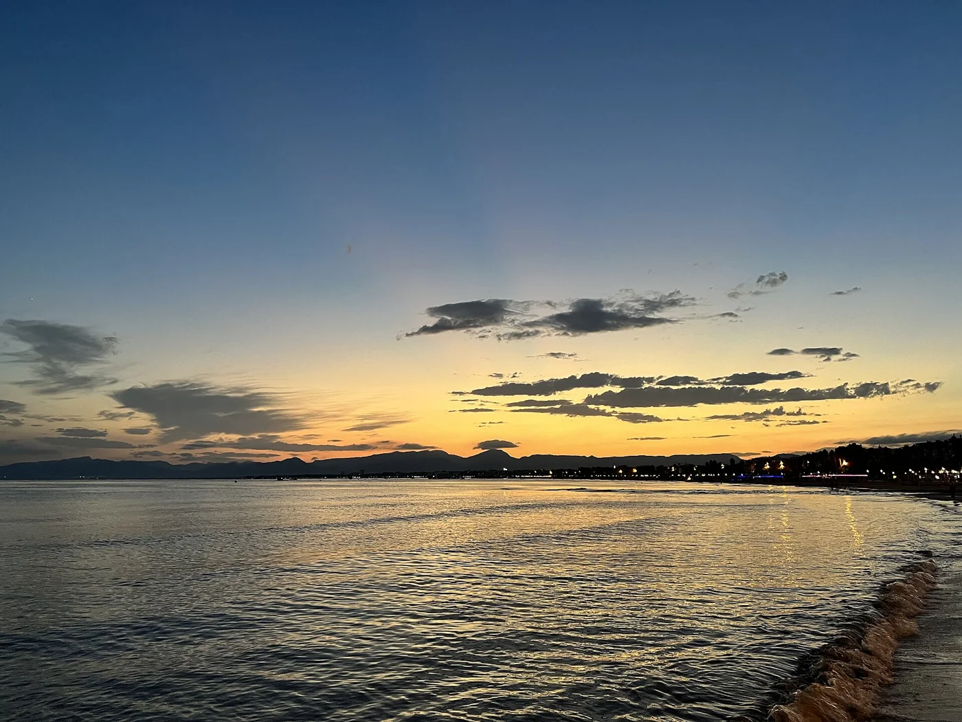 Sunset across the beach and Mediterranean coast at Salou