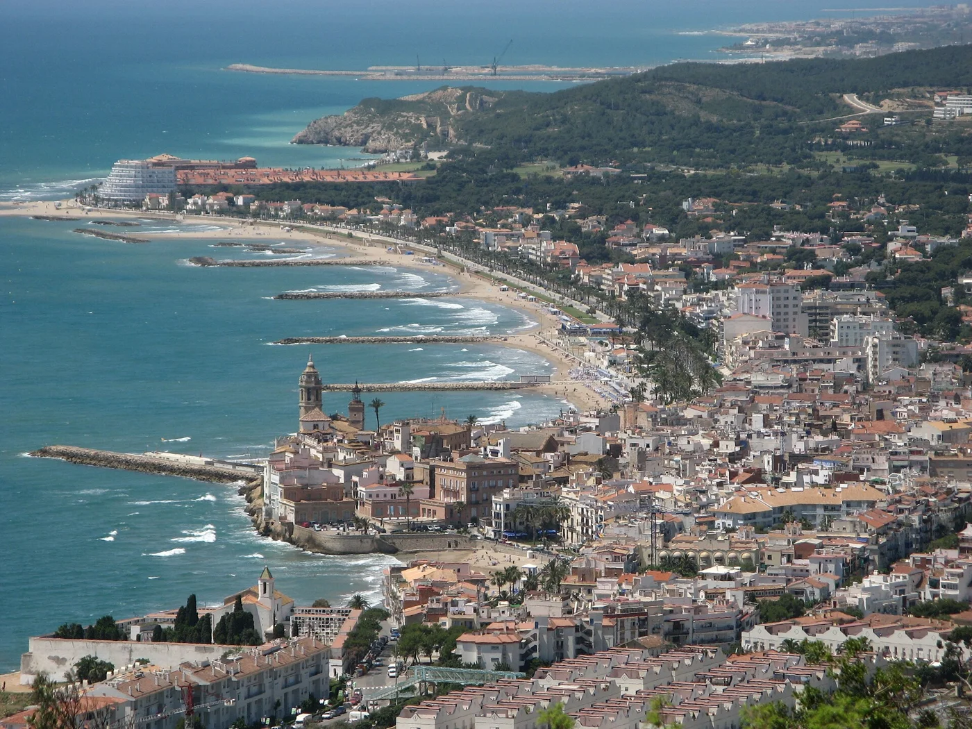 Sitges coastline, beach and old town beside the Mediterranean