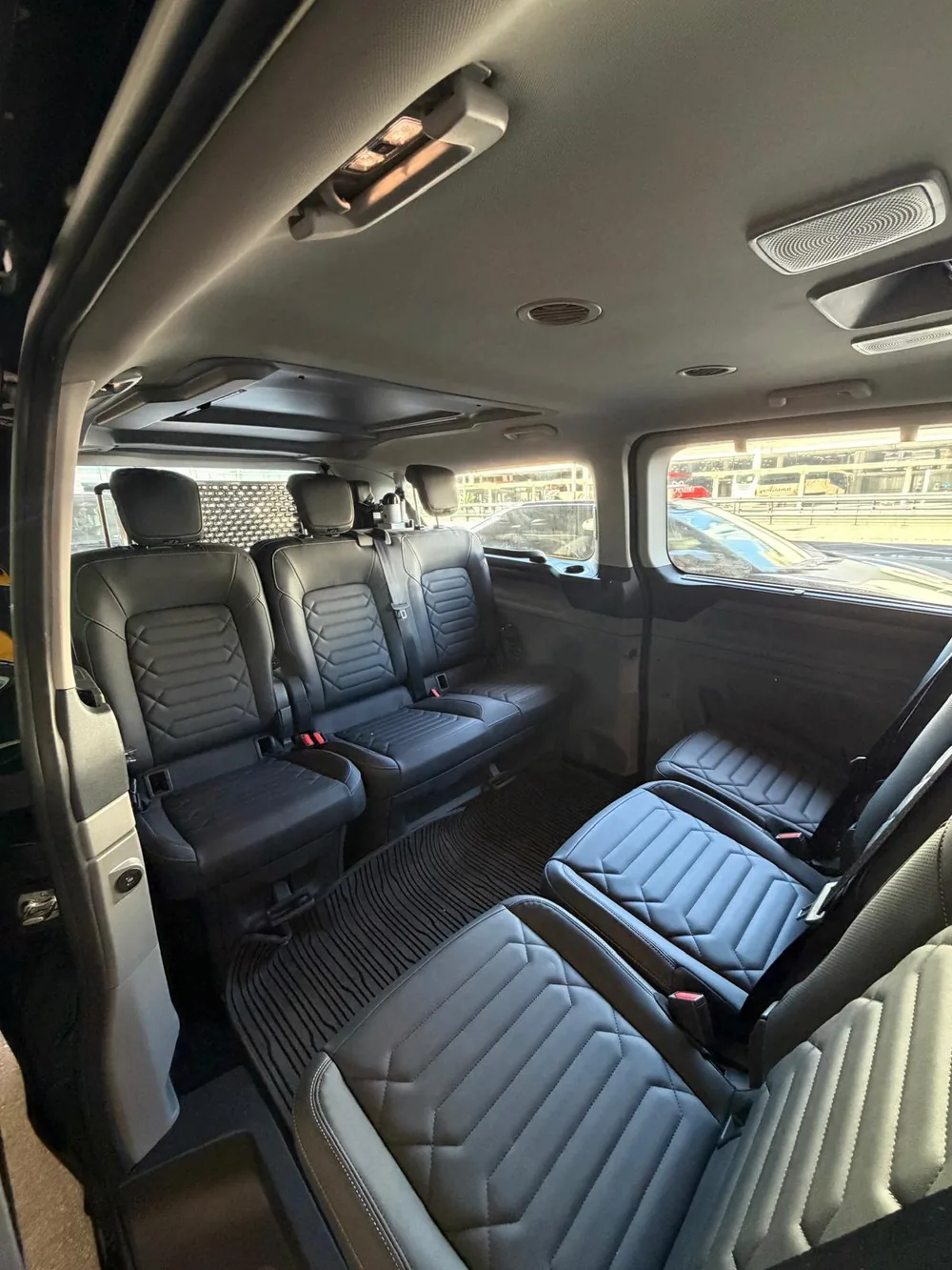 Spacious passenger cabin with facing rows of seats